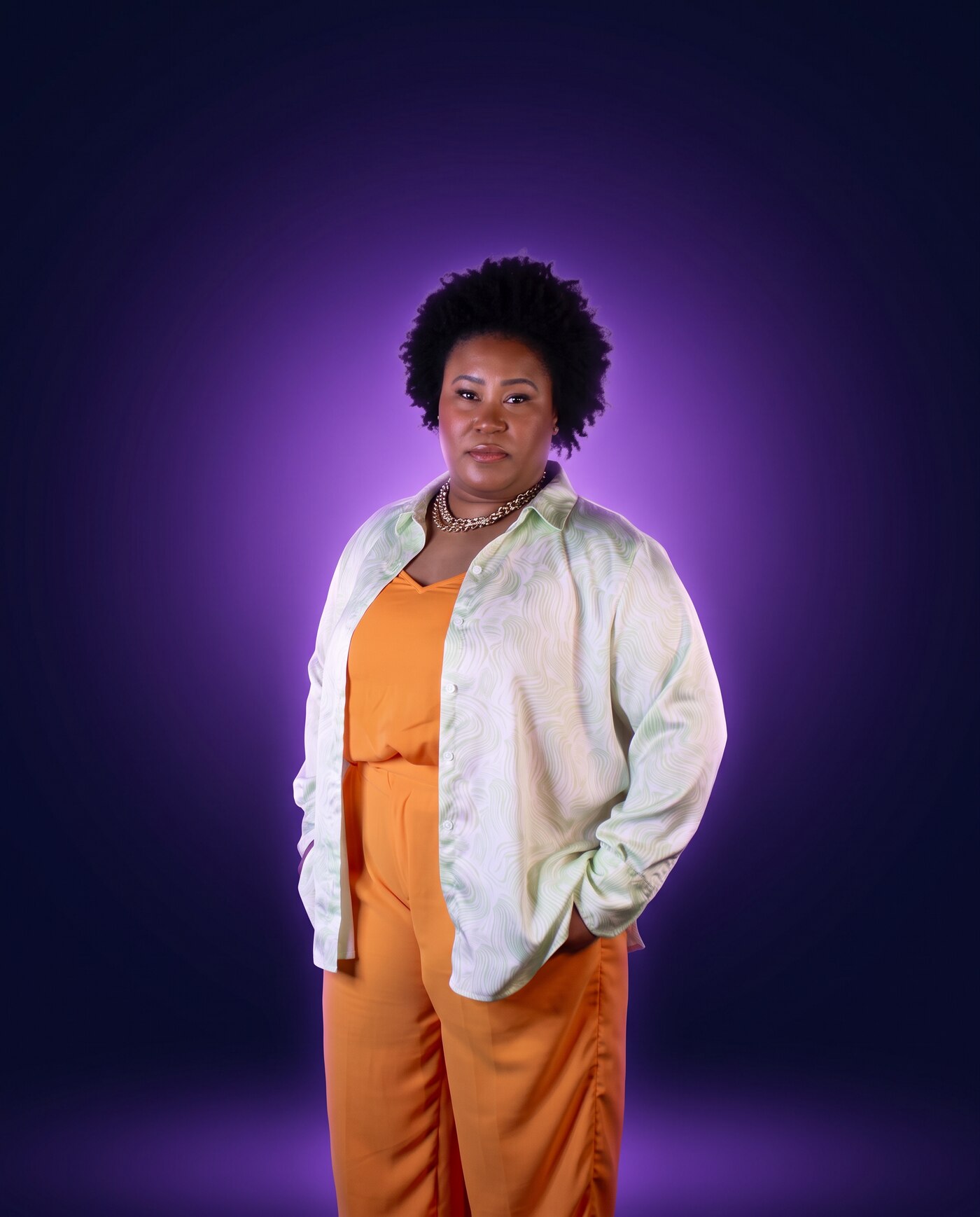 Natalie James standing tall against a purple glow, candidate for Little Rock City Director Ward 7